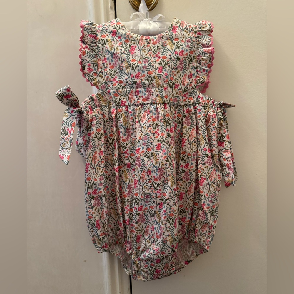 Floral Baby Romper with Pink Accents. 18 months